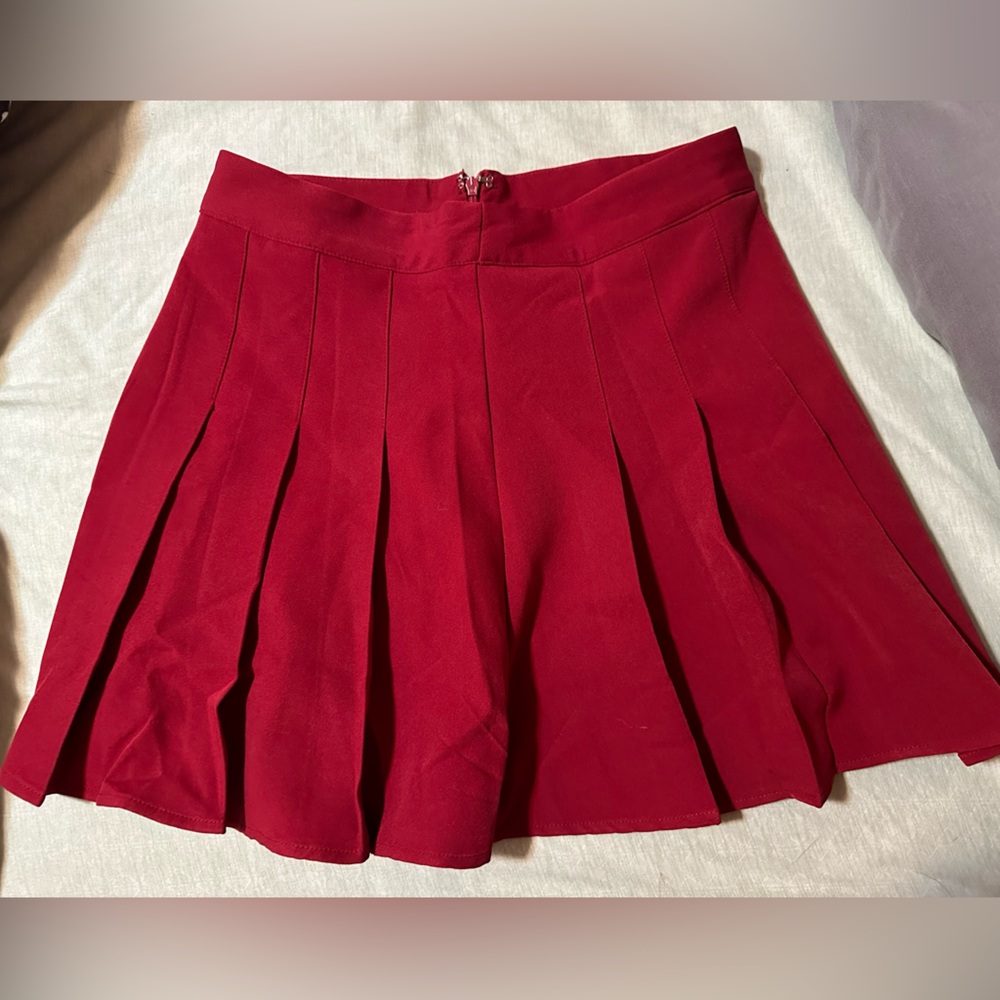 Women’s burgundy tennis skirt. Never worn!